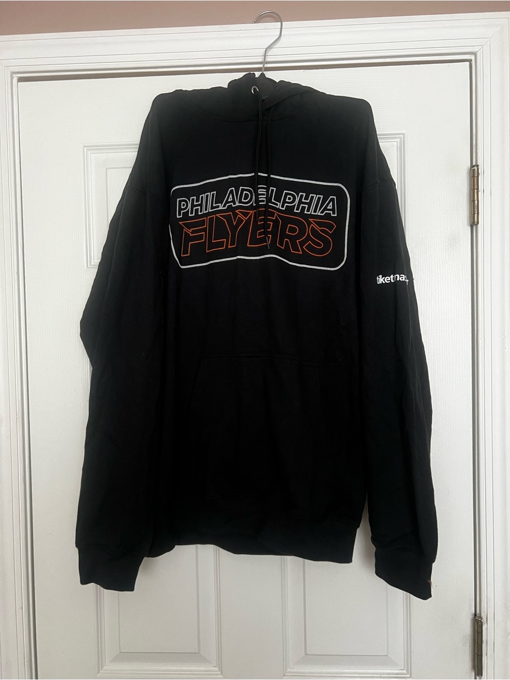 The Philadelphia Flyers NHL team hoodie with a Ticketmaster logo on the sleeve